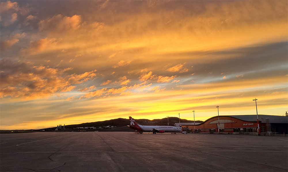 Airplane parked at Iqaluit airport terminal