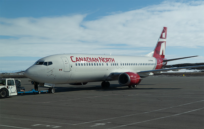 Canadian North plane parked at terminal